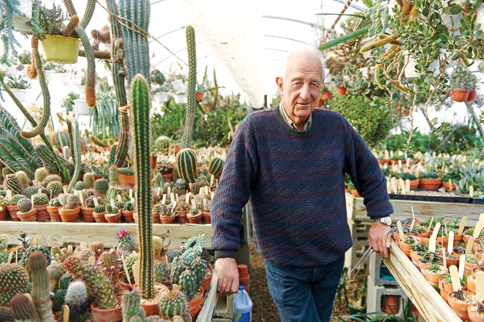 Bill Hendricks in his greenhouse