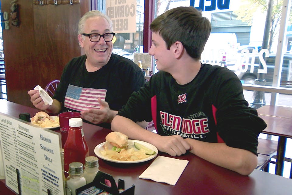 Scott Raab and Son at Huron square deli