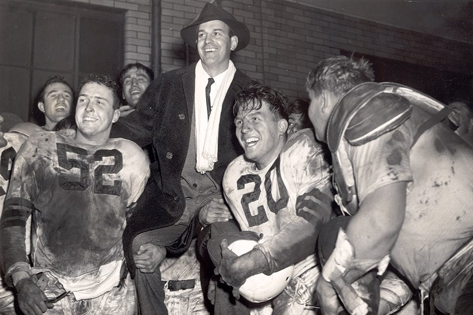 Paul Brown with Football Players