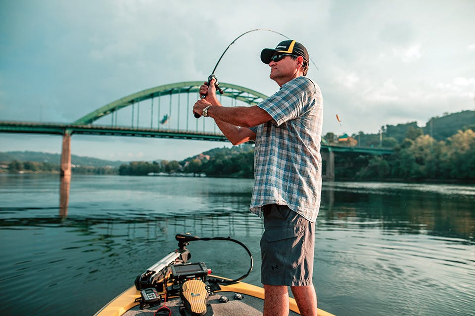 Man fishing on the Ohio River Man fishing on the Ohio River