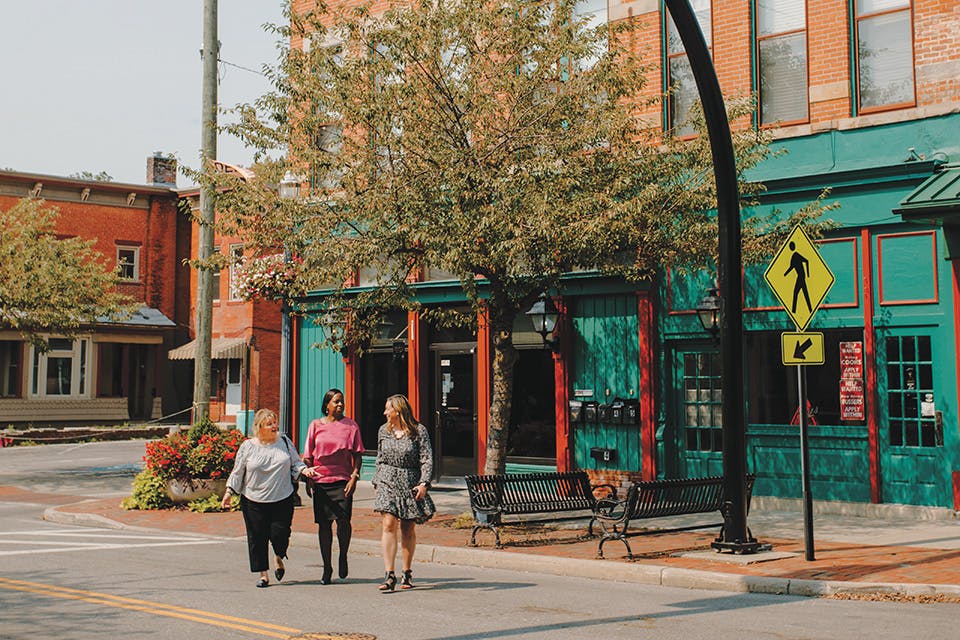 Delaware, women crossing street in front of Buns Restaurant (photo by Megan Leigh Barnard)