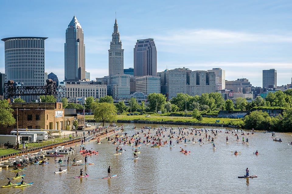 Blazing Paddles Paddlefest in front of Cleveland skyline