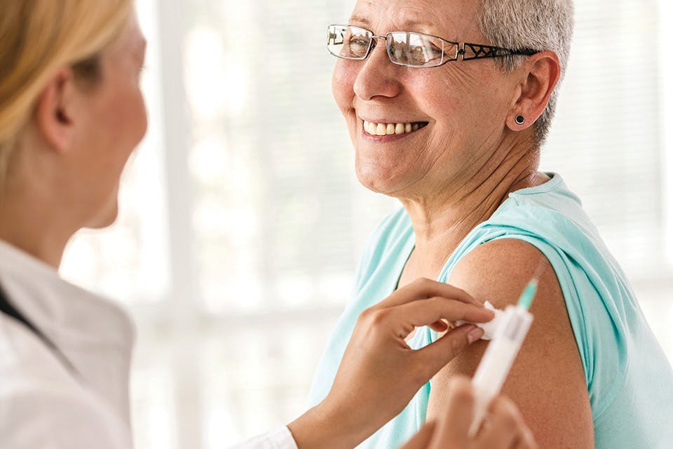 Women getting a vaccination