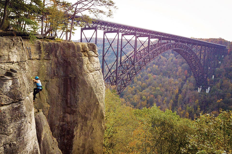 Woman climbing at New River gorge in West Virginia