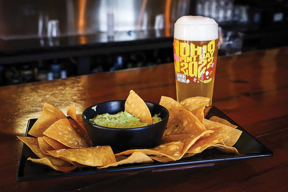 Beer, tortilla chips and guacamole at Dayton’s Fifth Street Brewpub (photo courtesy of Fifth Street Brewpub)