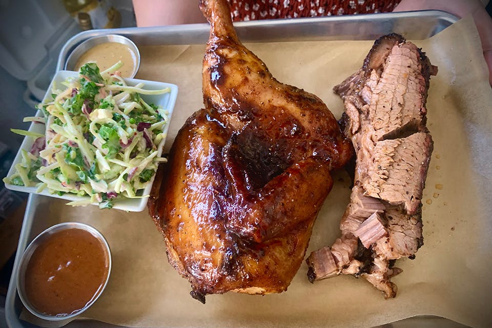 Brisket, chicken and coleslaw at Benny & Babe in Marietta