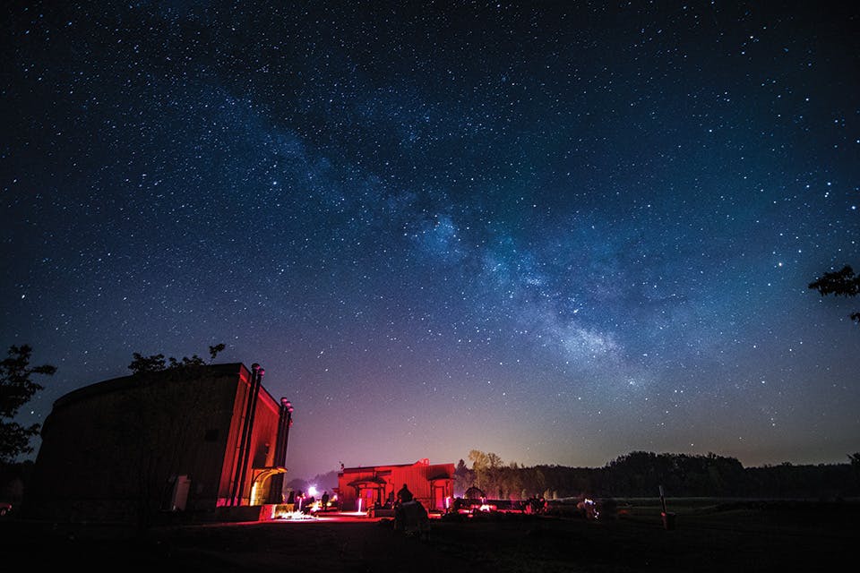 Landscape of building and night sky at Observatory Park in Montville (photo by Andrew Gacom Photography)