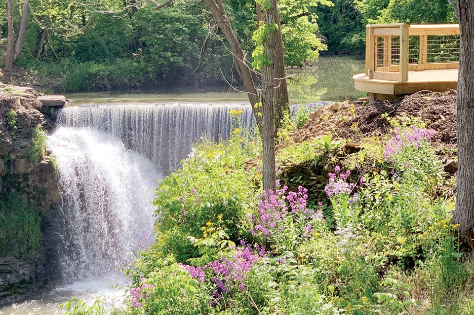 Waterfall and flowers at Greene County’s Indian Mound Reserve (photo courtesy of Greene County Parks & Trails)