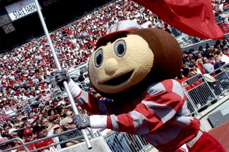 Brutus Buckeye running onto the field in 2001 (photo courtesy of The Ohio State University Archives)