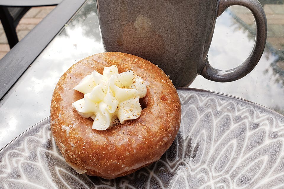 Pumpkin doughnut and coffee from Columbus’ Resch’s Bakery (photo courtesy of Resch’s Bakery)
