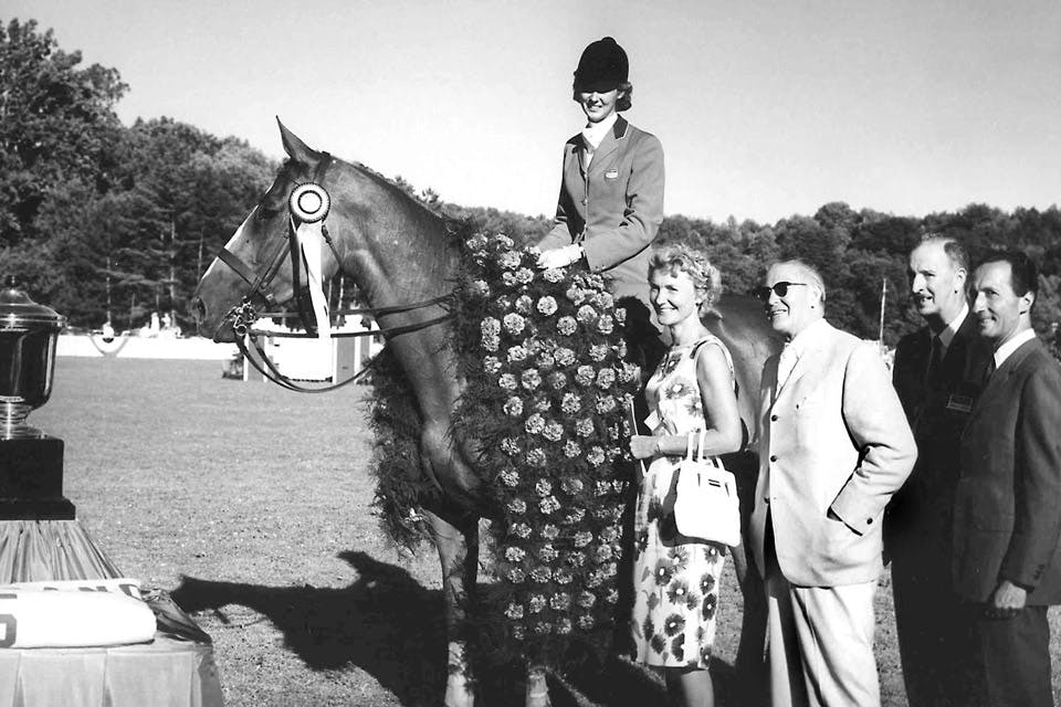 Rider Mary Chapot aboard horse Tomboy receiving award as winners of the first Cleveland Grand Prix in 1965 (photo courtesy of CVPHA and ‘The Cleveland Grand Prix: A Show Jumping First” by Betty Weibel)
