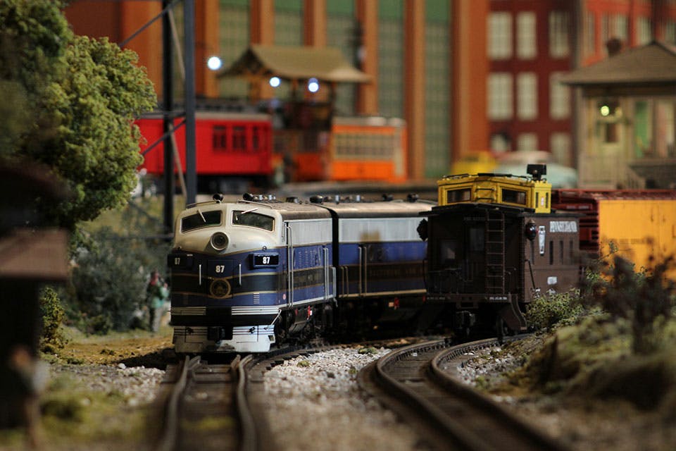 Two trains run on one of the displays at Entertrainment Junction (photo courtesy of Entertrainment Junction)