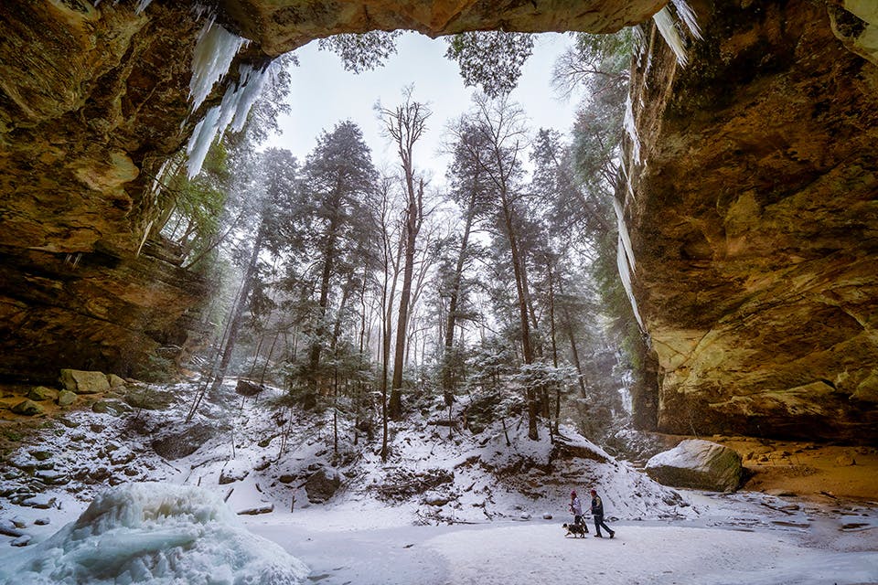 Two people hiking at Logan’s Ash Cave in the winter (photo by Arthur O’Leary)