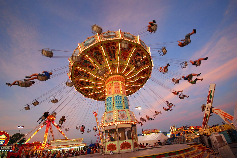 Swing ride at sunset at Ohio State Fair in Columbus (photo by Randall L. Schieber)