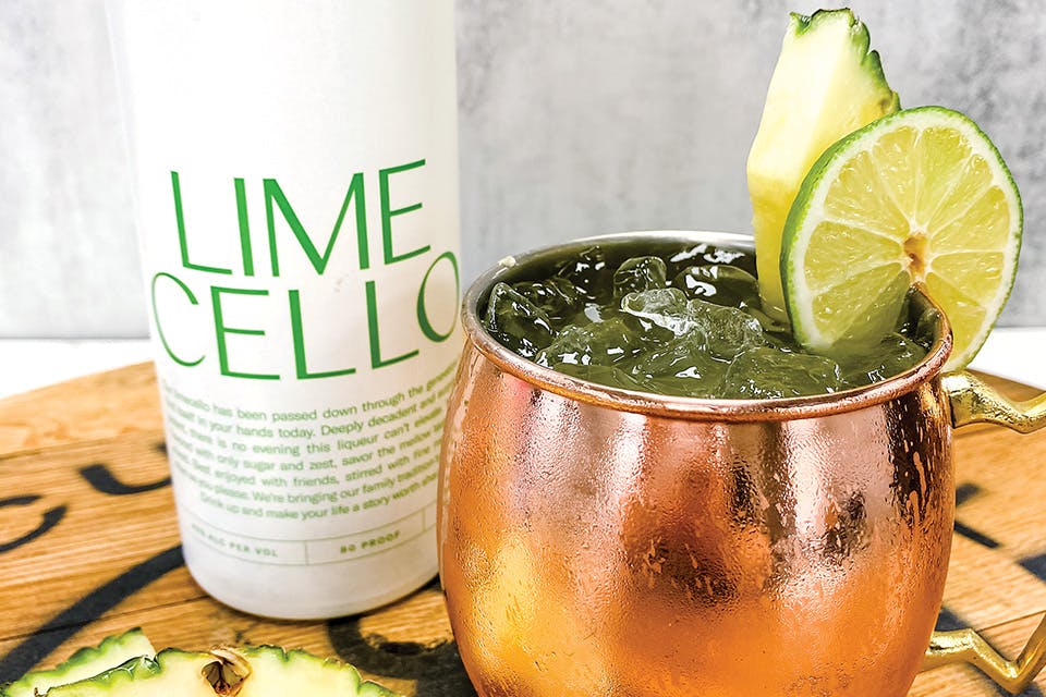 Can of Noble Cut Distillery's Limecello next to pineapple lime mule (photo courtesy of Noble Cut Distillery)