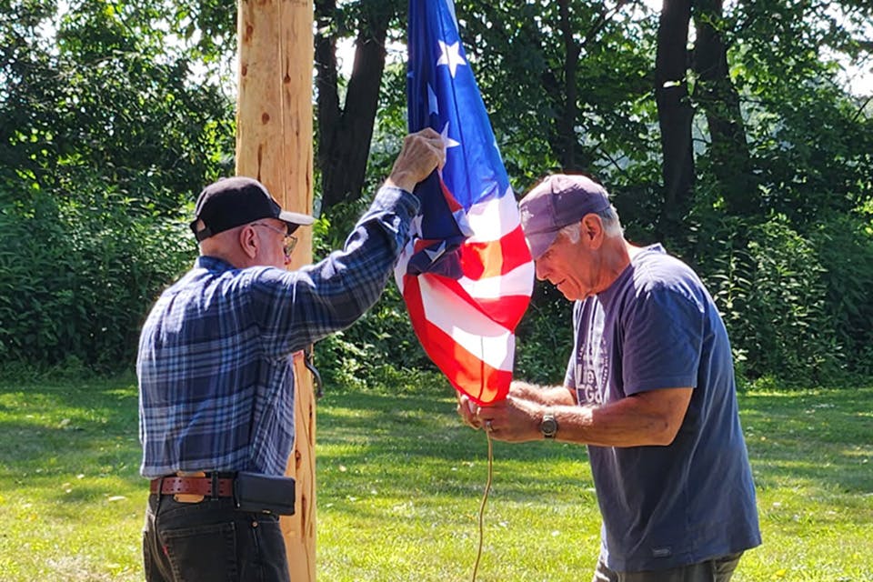 Martin Zawackey (left) and Doug Angeloni (right) raise the flag at Fort Laurens on Aug. 1, 2025. (photo courtesy of Ohio History Connection) Martin Zawackey (left) and Doug Angeloni (right) raise the flag at Fort Laurens on Aug. 1, 2025. (photo courtesy of Ohio History Connection)