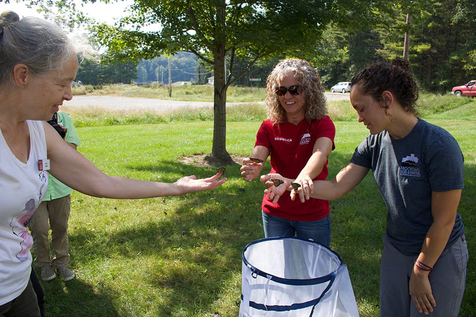 Women holding monarch butterflies at the Monarch Waystation and Butterfly Garden at the Hocking Hills Regional Welcome Center in Logan (photo courtesy of Explore Hocking Hills) Women holding monarch butterflies at the Monarch Waystation and Butterfly Garden at the Hocking Hills Regional Welcome Center in Logan (photo courtesy of Explore Hocking Hills)
