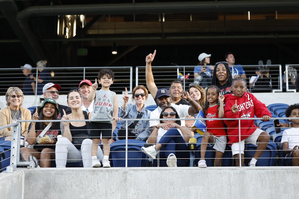 People cheering in stands at NFL Flag Championship at Hall of Fame Village (photo courtesy of NFL FLAG)