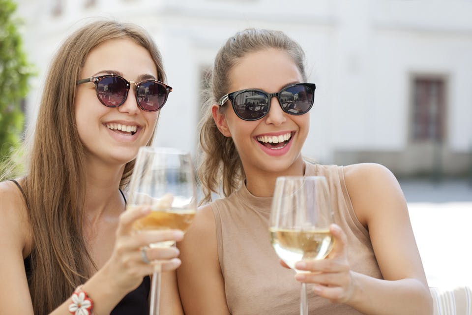 Two women holding wine glasses at Vintage Ohio Wine Festival (photo courtesy of Ohio Wine Producers Association) Two women holding wine glasses at Vintage Ohio Wine Festival (photo courtesy of Ohio Wine Producers Association)