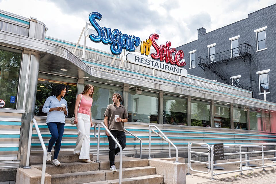 People walking outside Sugar n’ Spice in Cincinnati (photo by Matthew Allen) People walking outside Sugar n’ Spice in Cincinnati (photo by Matthew Allen)
