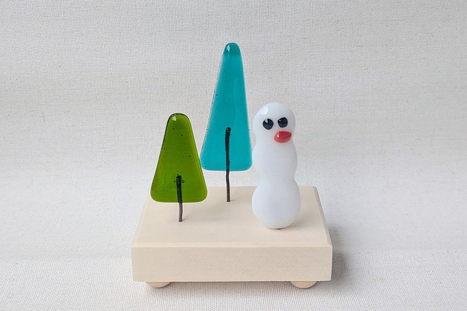 Tree and snowman recycled glass art from Jennifer L Worden Arts in Canton (photo courtesy of Jennifer L Worden Arts) Tree and snowman recycled glass art from Jennifer L Worden Arts in Canton (photo courtesy of Jennifer L Worden Arts)