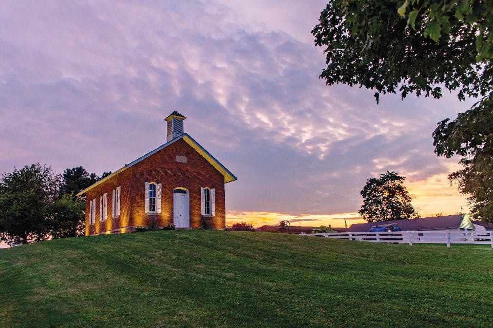 Exterior of Cornell School in Johnstown at sunset (photo by DiBlasio Photography)