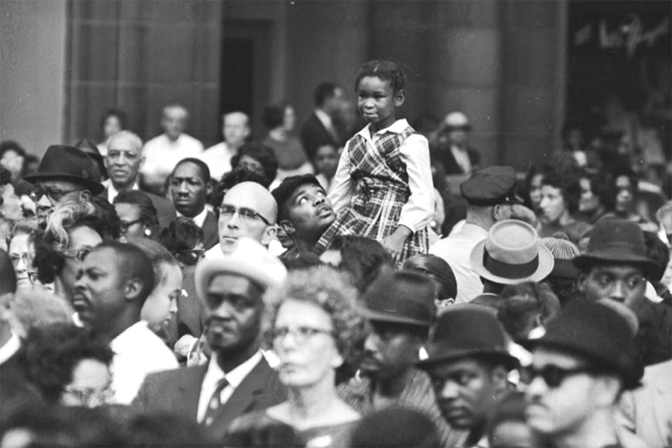 Little girl sitting on man’s shoulders at Cincinnati’s March and Vote for Jobs and Freedom in 1963 (photo courtesy of Ohio History Connection)
