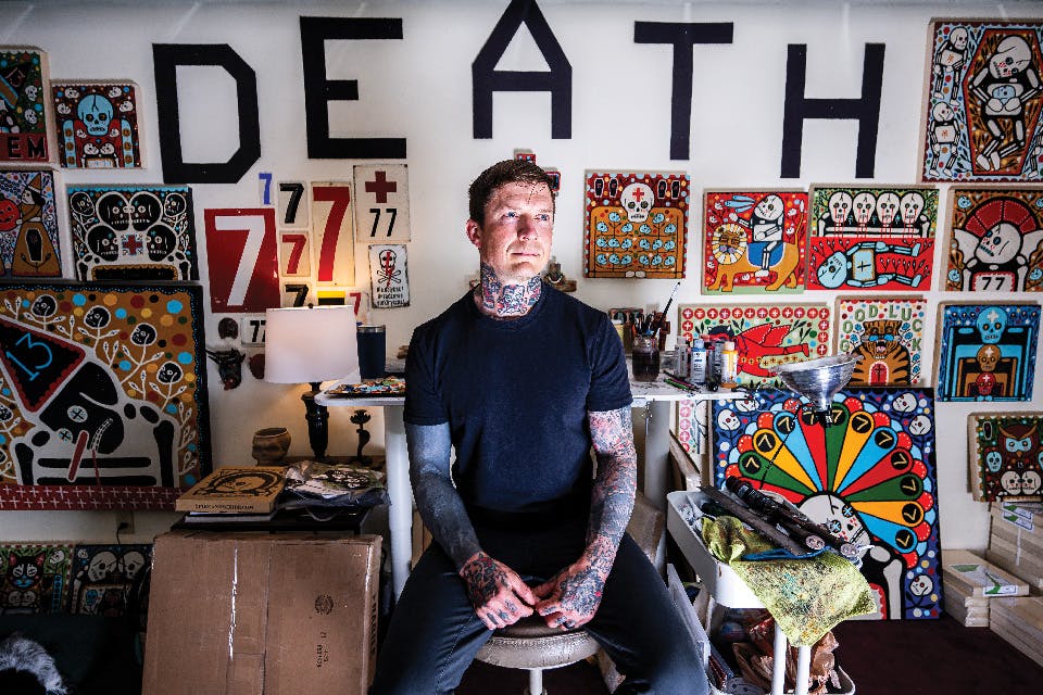 Youngstown artist Mike Egan among his artwork and “DEATH” signage in his studio (photo by Ken Blaze) Youngstown artist Mike Egan among his artwork and “DEATH” signage in his studio (photo by Ken Blaze)