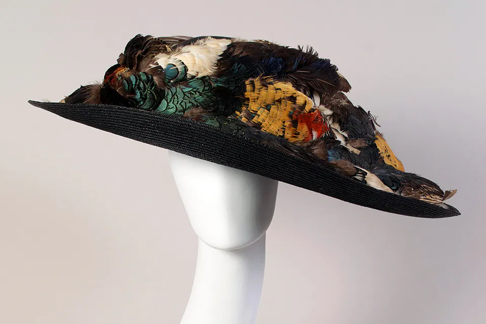 Wide straw hat with Lady Amherst’s pheasant (Collection of the Kent State University Museum, Silverman/Rodgers)
