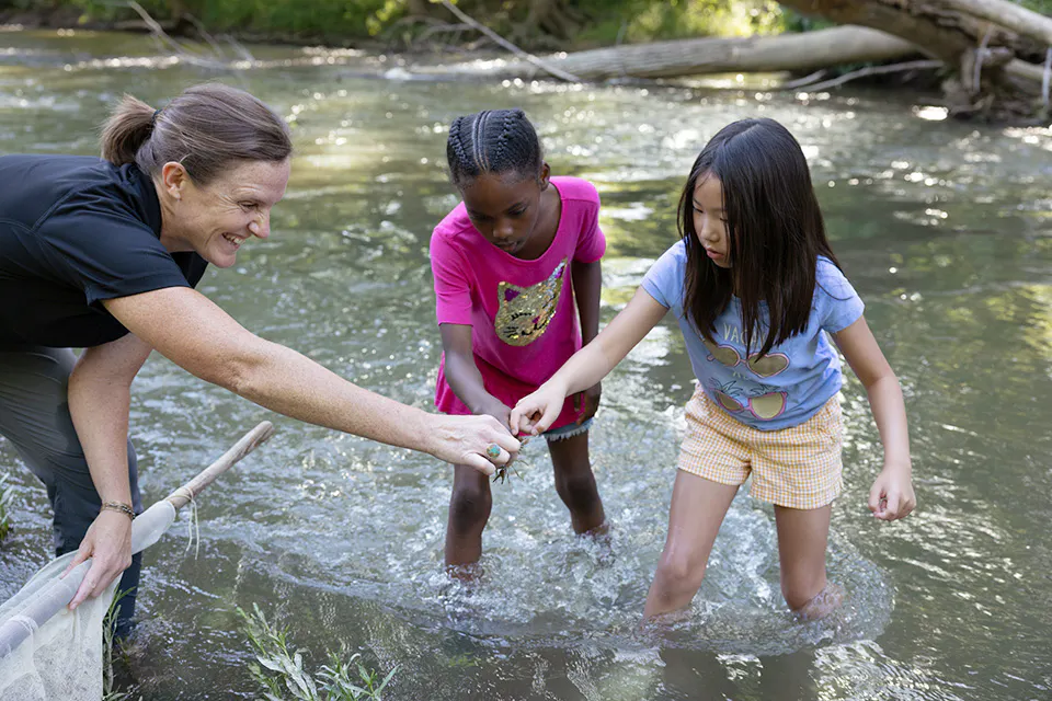 Woman and kids at Creeking Expedition at Scioto Trail State Park in Chillicothe (photo by Josiah Wade)