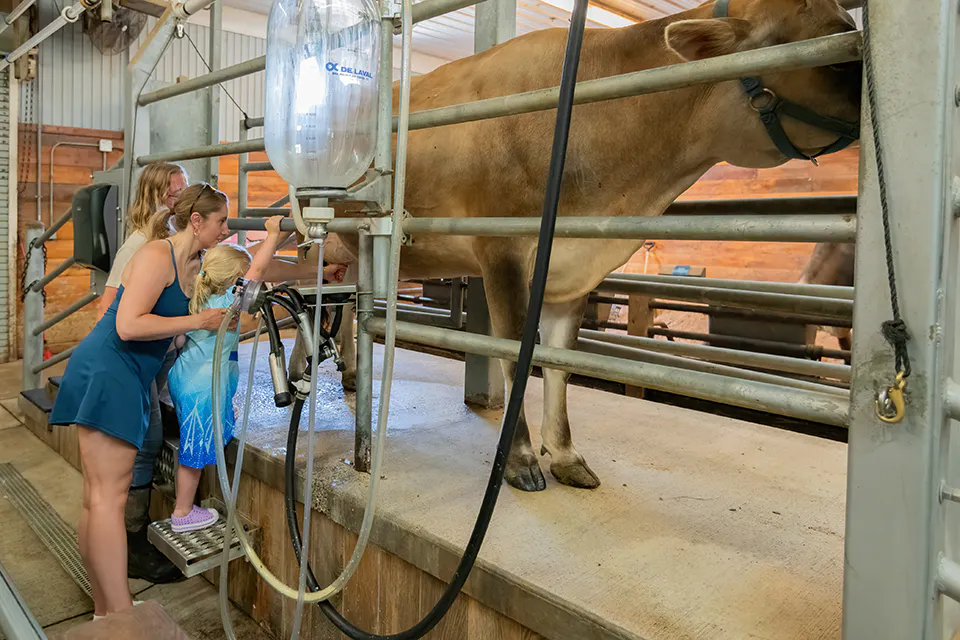 Family at Lake Metroparks’ Farmpark Dairy Days in Kirtland (photo by Joan T. Neubecker)