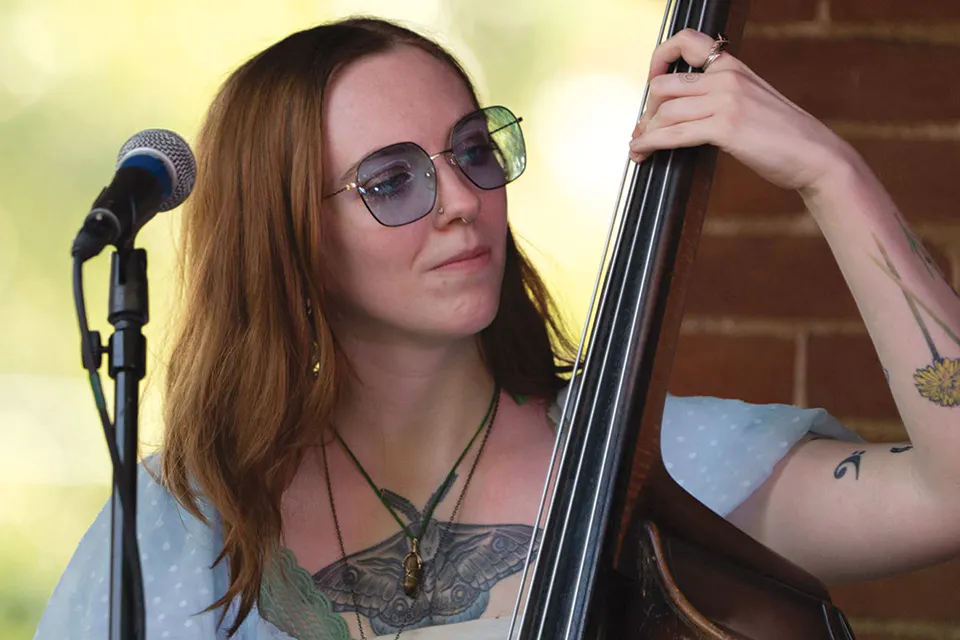 Female cellist at Front Porch Concert Series (photo courtesy of Knox County Convention & Visitors Bureau)