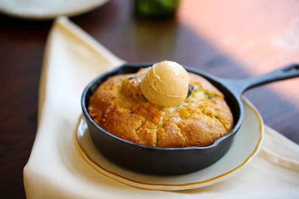 Poblano cornbread in skillet at The Clocktower Kitchen & Bar in Plain City (photo courtesy of The Clocktower Kitchen & Bar in Plain City)